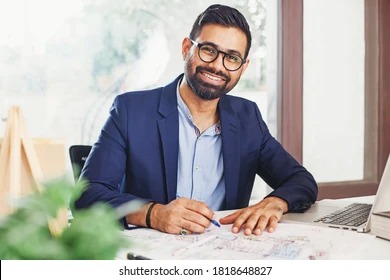 handsome-bearded-indian-architect-working-260nw-1818648827